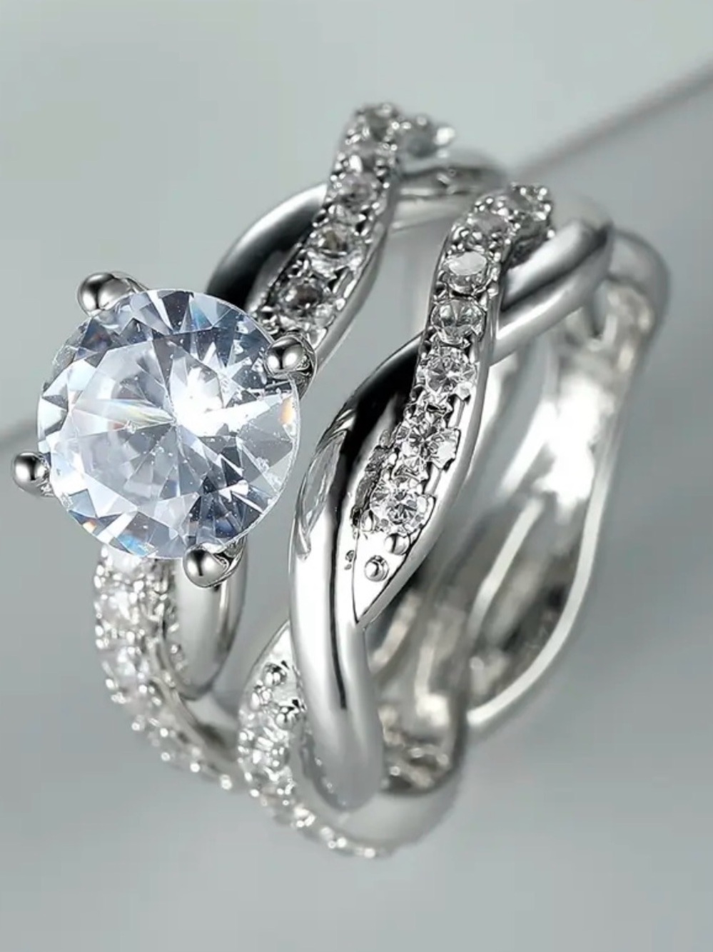 Silver Tone Solitaire Twist Ring.